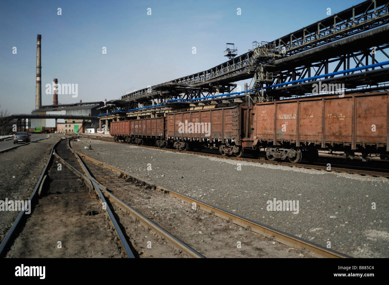 Railway goods trucks at Donetsk steel mill in Eastern Ukraine Stock Photo