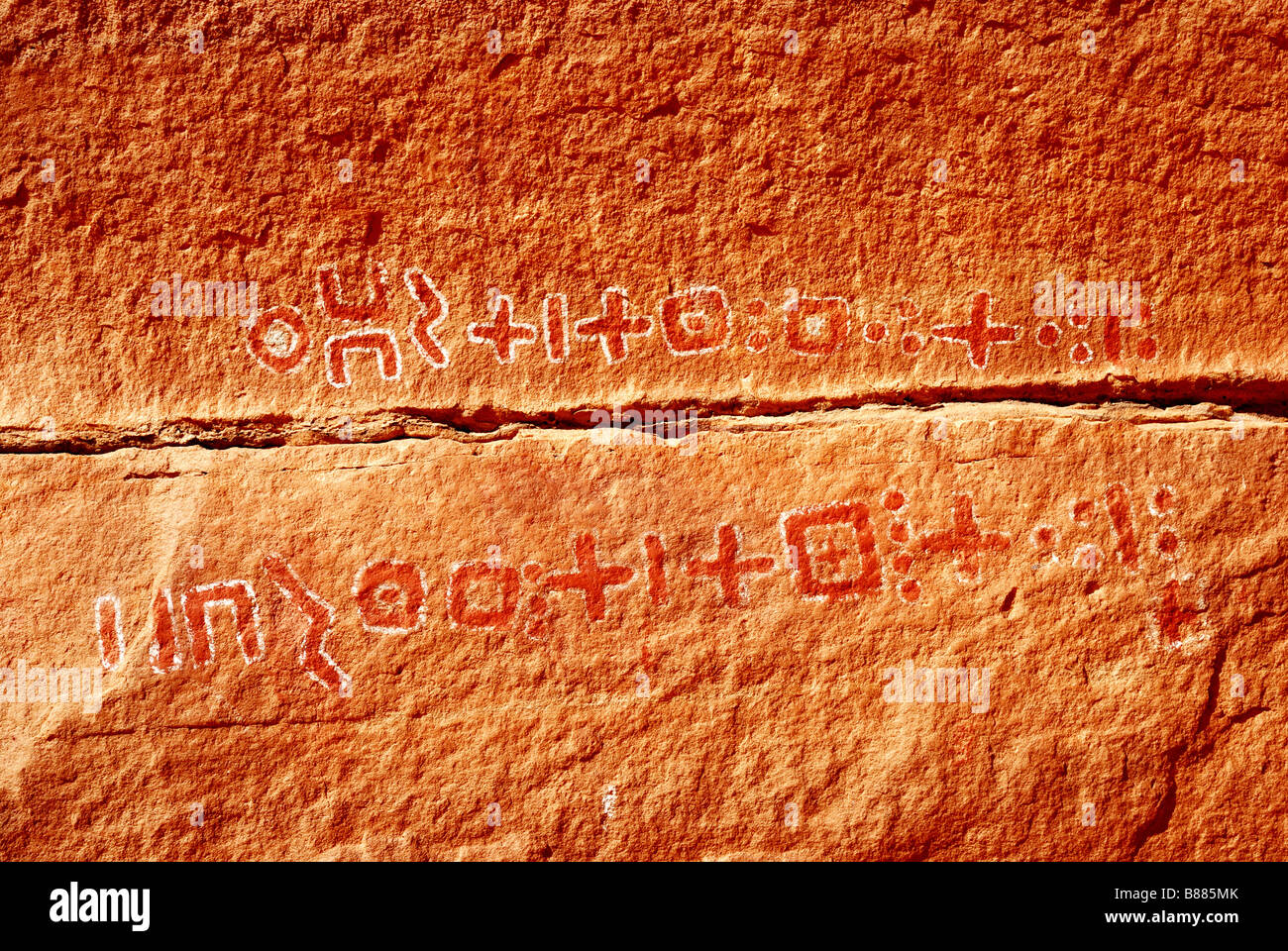 Tifinagh scripts in Messak Mellel (Wadi Mellel or Messak Mellet) Stock Photo