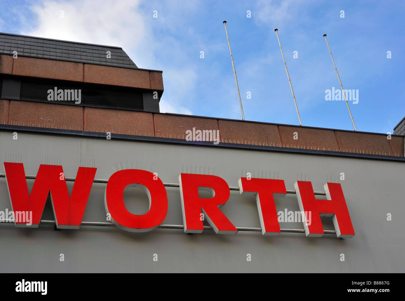 worth woolworths neon sign woolies department store closed credit crunch out of business Stock Photo