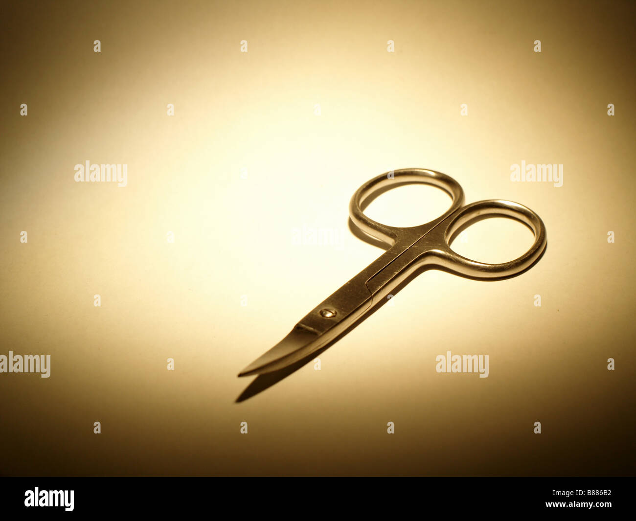 Nail scissors on while background Stock Photo - Alamy