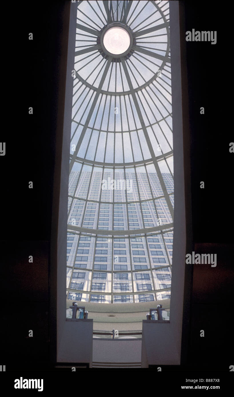 Canary Wharf  viewed from between the escalators below Stock Photo