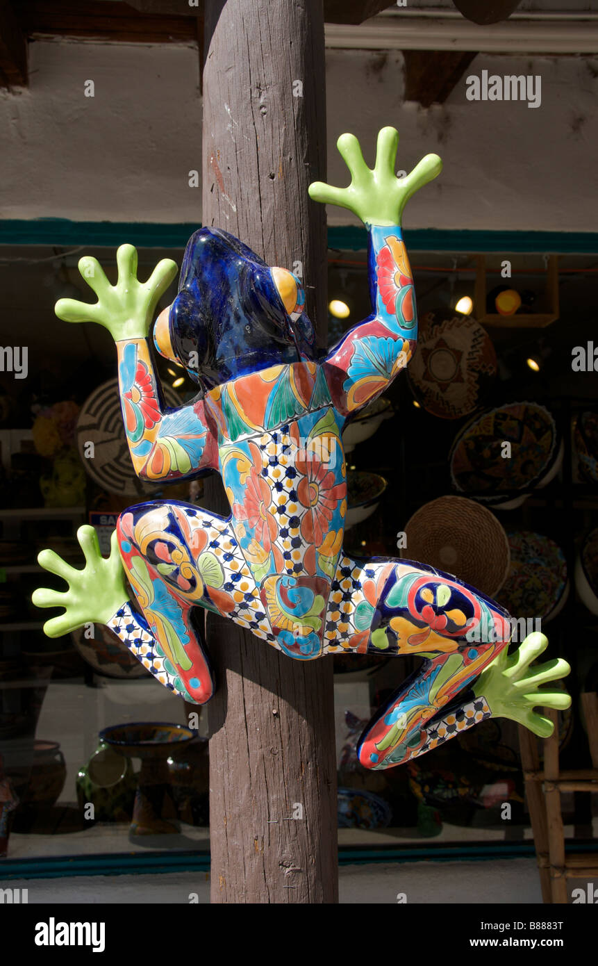 Colourful frog outside pottery shop Taos New Mexico USA Stock Photo