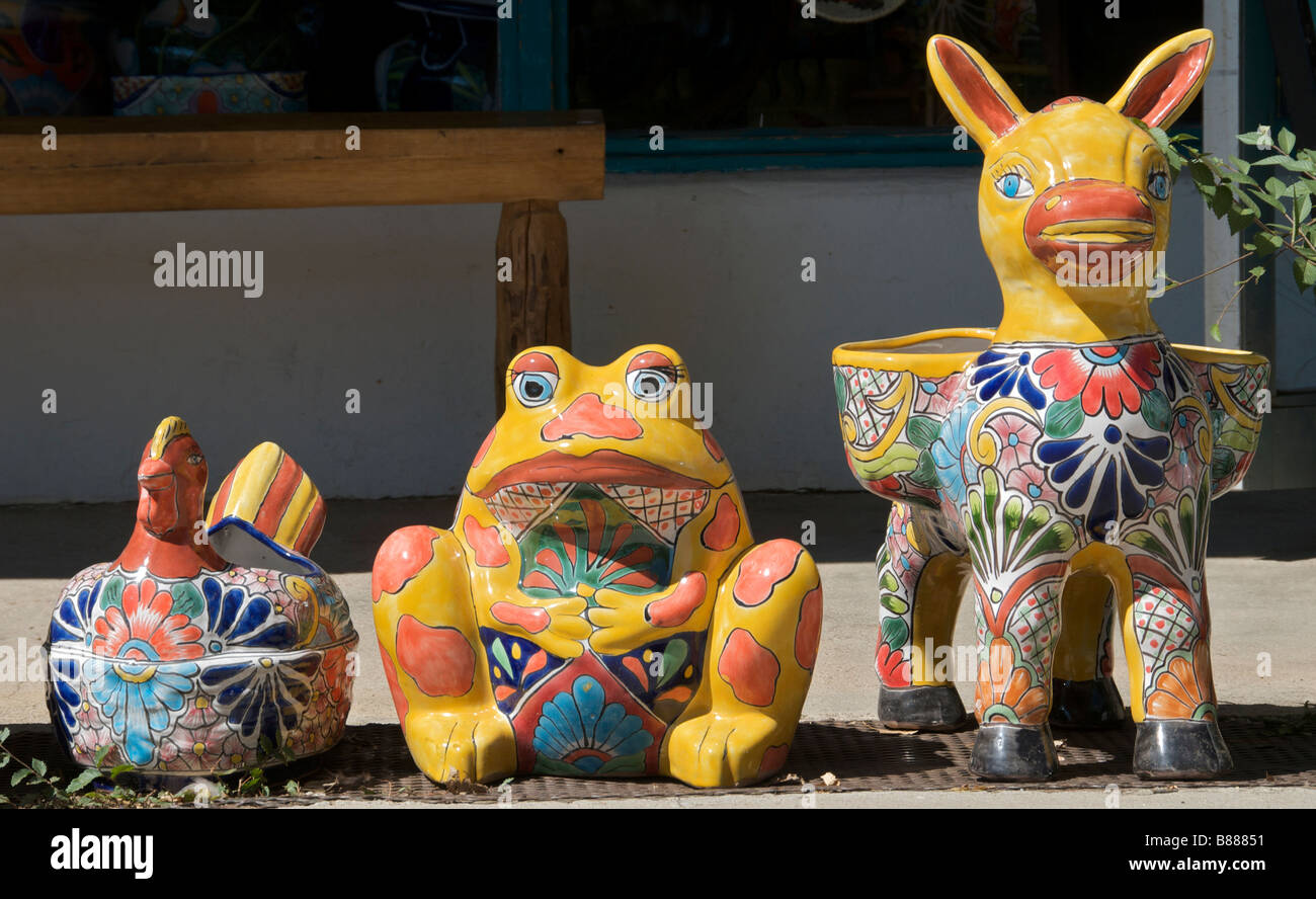 Colourful Mexican pottery of donkey frog and hen Taos New Mexico USA Stock Photo