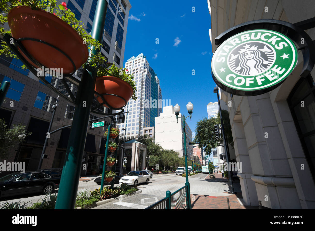 Starbucks coffee shop on Orange Avenue at the intersection with Jackson Street, Business District, Downtown Orlando, Florida Stock Photo