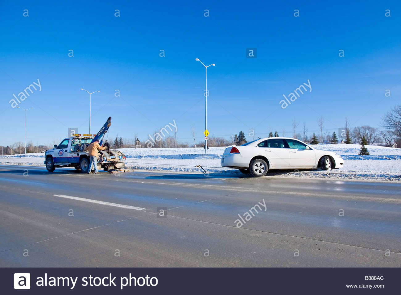 Tow Truck Towing Car Stock Photos & Tow Truck Towing Car Stock Images