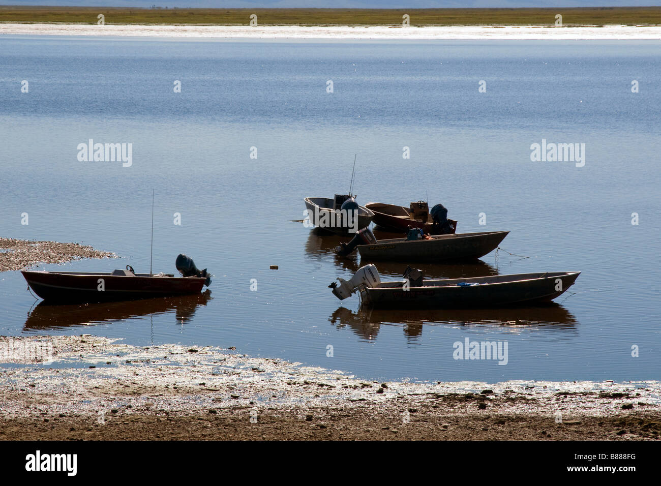Fishing boats wait on the Koyuk River in Alaska. Stock Photo