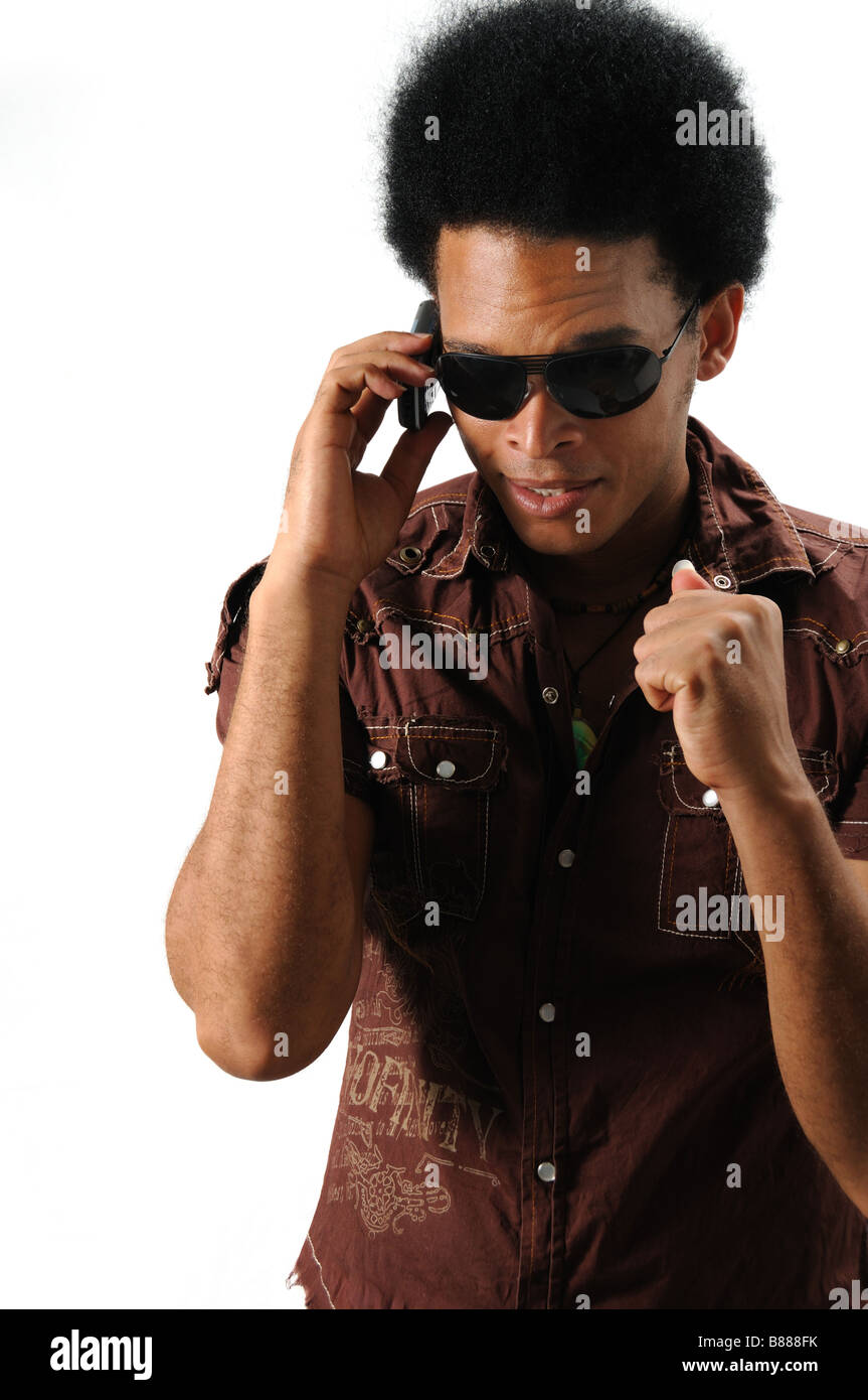 Cell Portrait Portrait of young trendy african hispanic man using cell phone ...