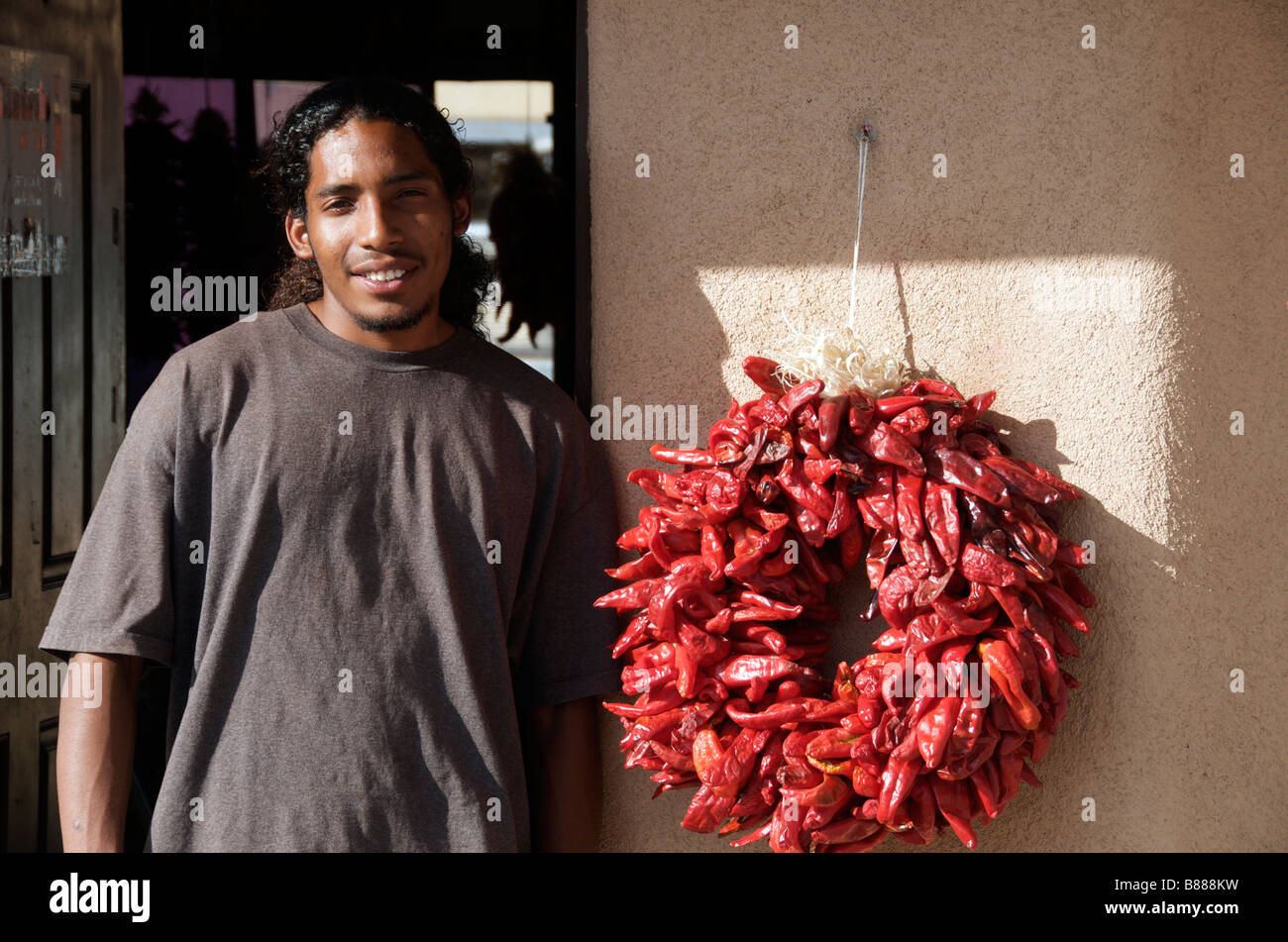 Portrait Indian shop owner outside chillie store Taos New Mexico USA Stock Photo