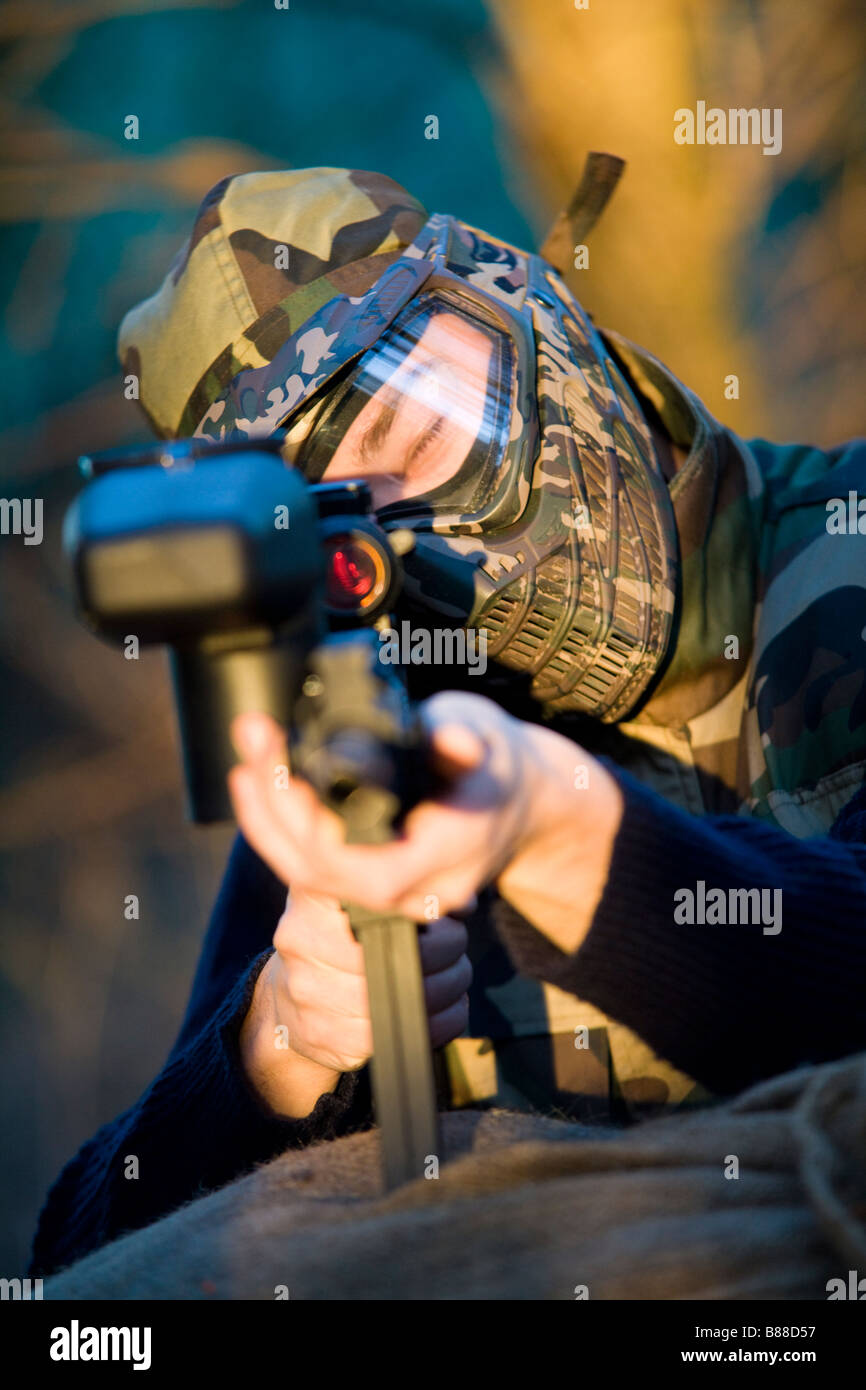 aiming a paintball marker Stock Photo Alamy
