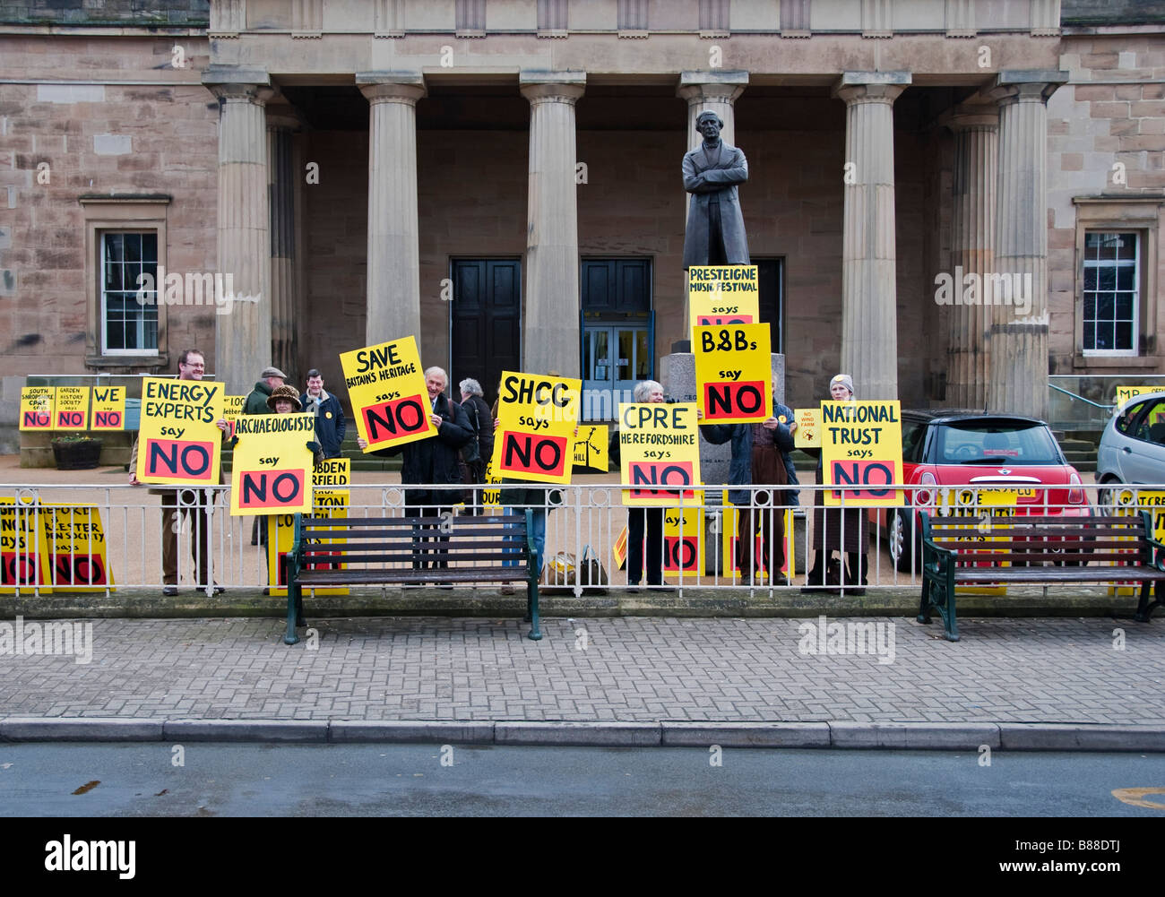 Protesters against the Reeves Hill / Stonewall Hill windfarm demonstrate outside the Shire Hall in Hereford, UK Stock Photo