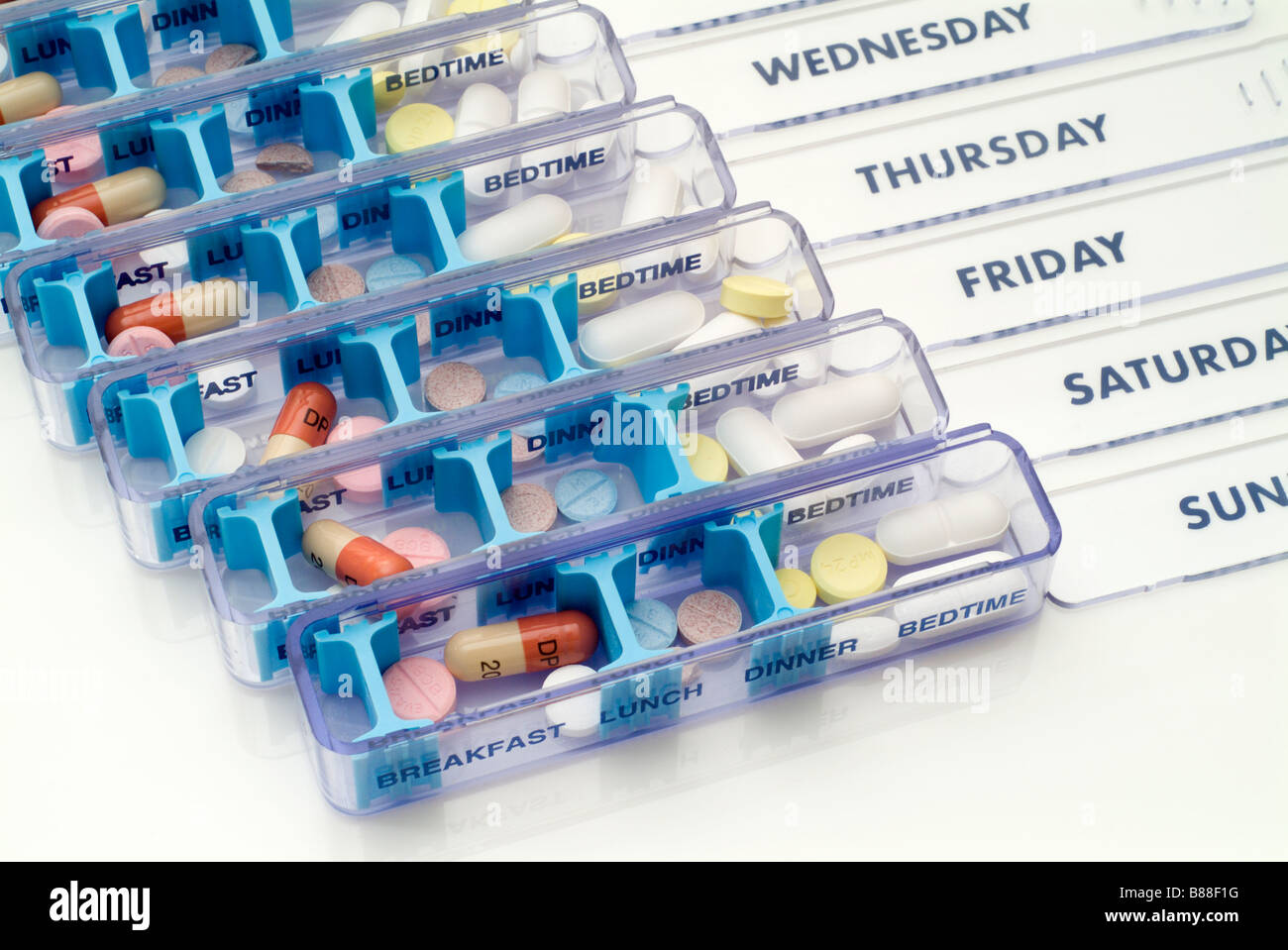 Medication tablet organiser dosage Stock Photo