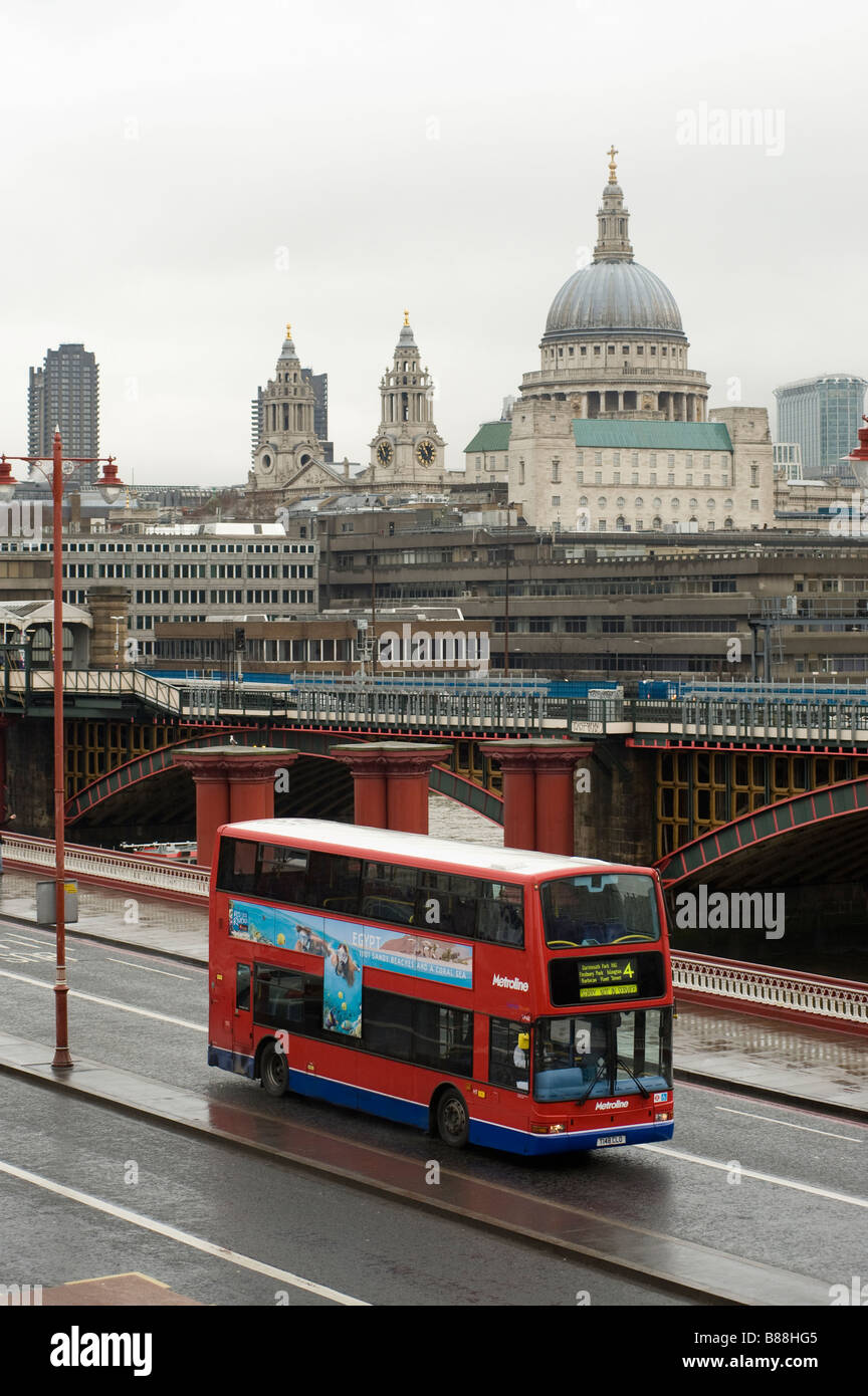 Double decker London bus crossing Blackfriars bridge in the city of London, England. Stock Photo