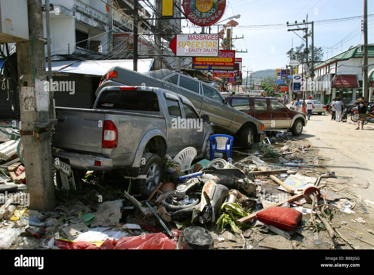 Debris and vehicles line the streets after the December 26, 2004 tsunami hit Patong Beach on Phuket Island, Thailand. Stock Photo