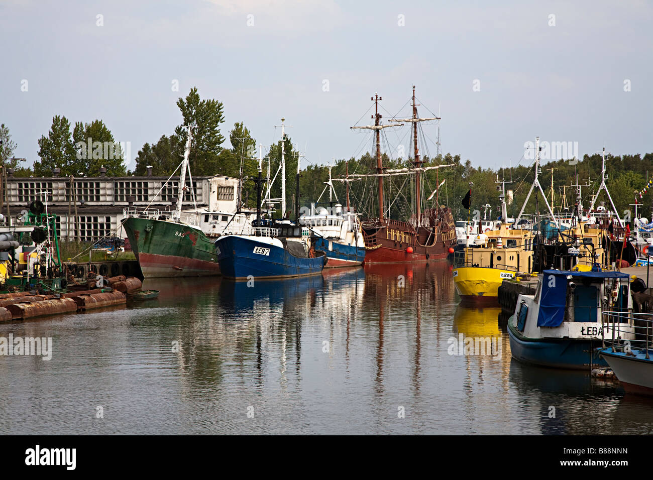 Fishing and tourist boats in harbour Leba Poland Stock Photo