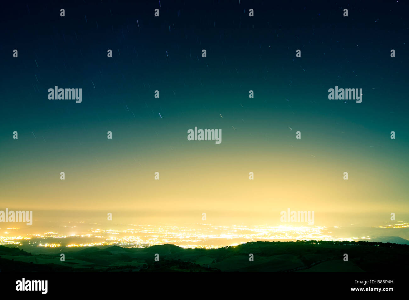 Stars Raining Season Stars raining over city at night Long exposed picture Stock Photo - Alamy