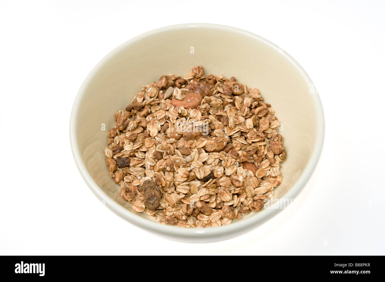 Granola Cereal rolled oats with dried fruits and nuts in a bowl on