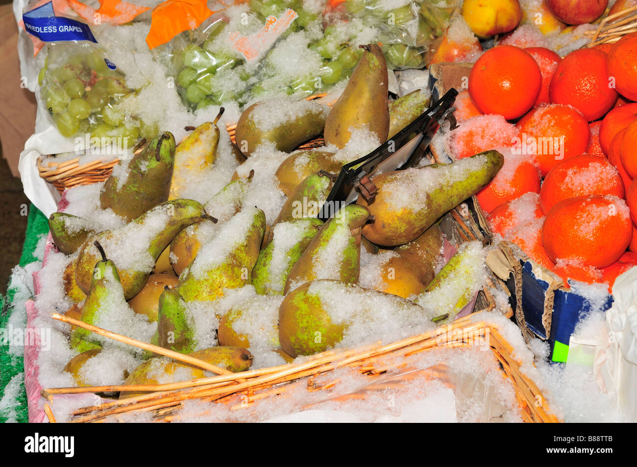 soft fruit covered in snow market stall Stock Photo