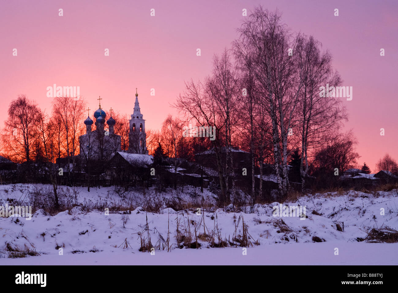 Russian village and an orthodox church at sunset Stock Photo - Alamy