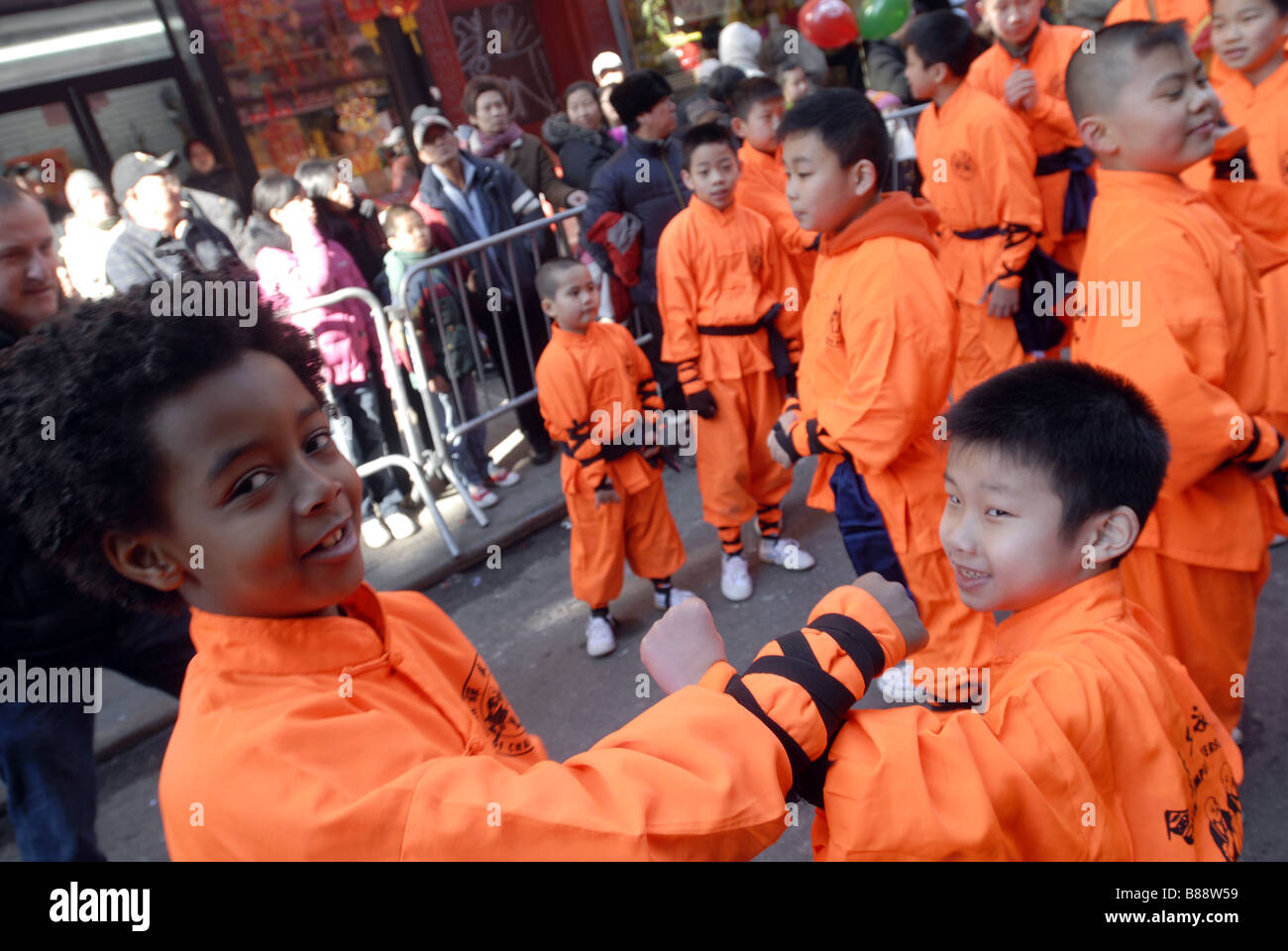 Students from a martial arts school practice in Chinatown prior to the