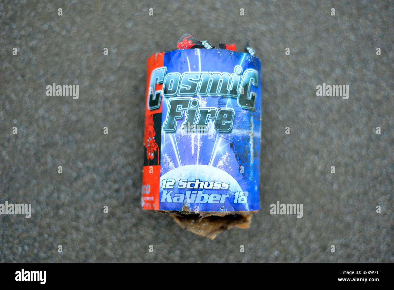 cosmic fire discarded firework street after the party celebration over Stock Photo