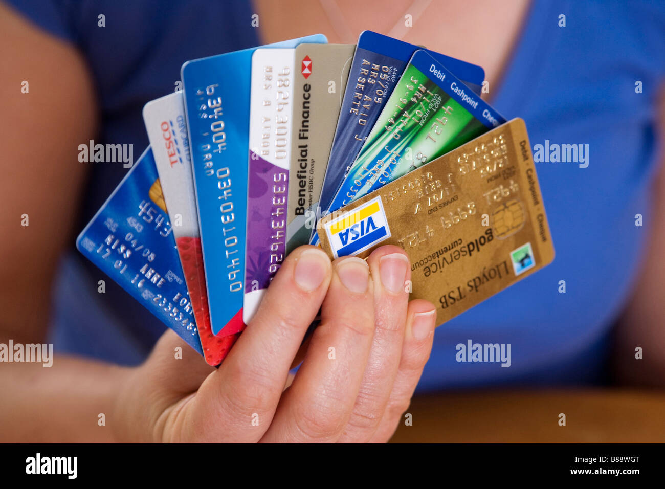 woman holding credit cards Stock Photo