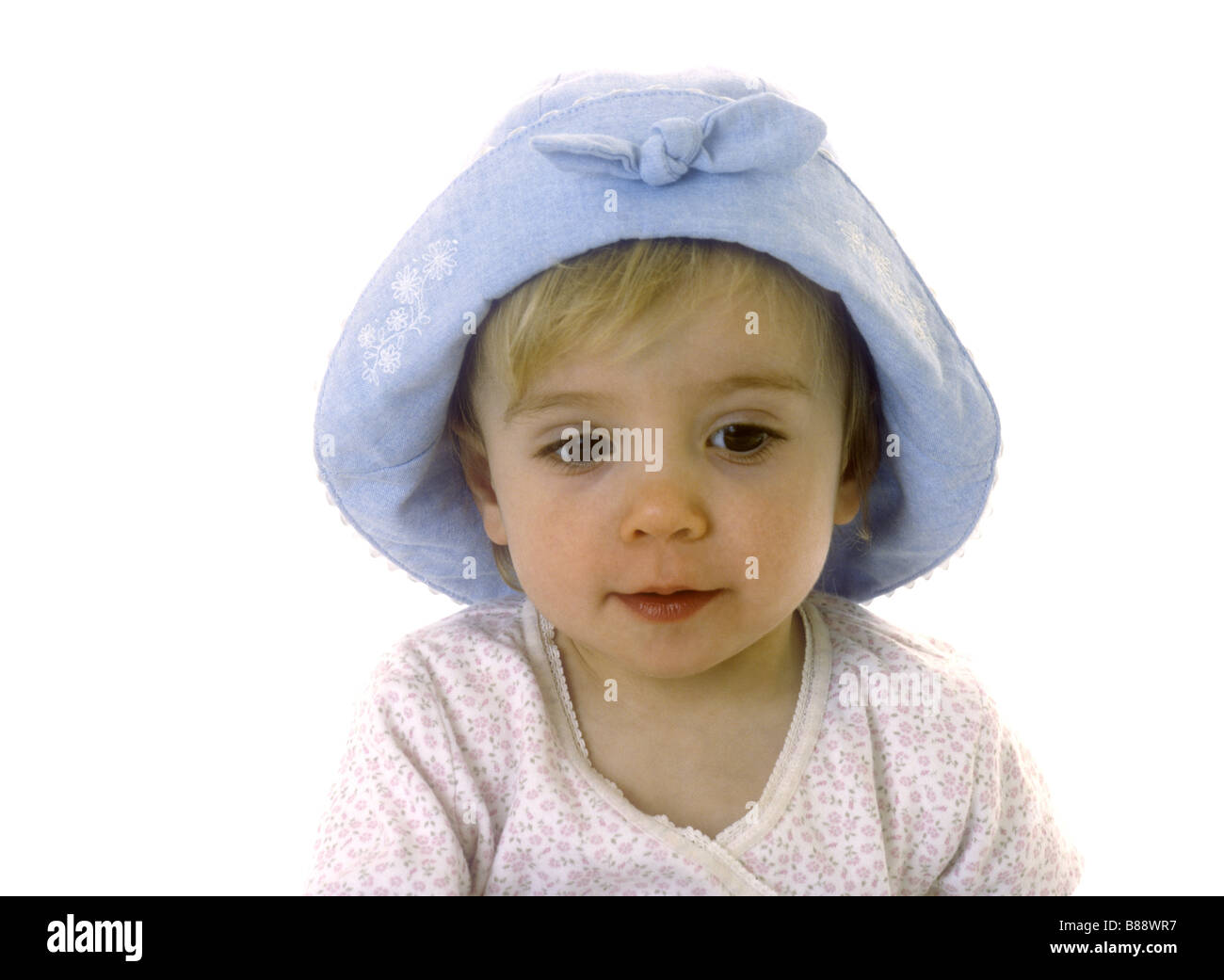 Toddler wearing a blue sun hat Stock Photo Alamy