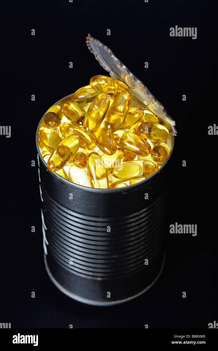 Fish Oil Capsules in a Tuna Fish Can Stock Photo Alamy