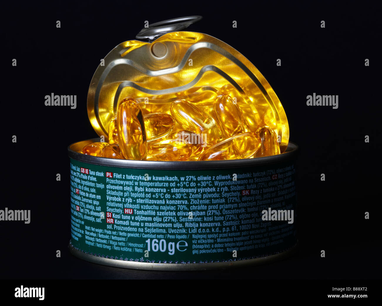 Fish Oil Capsules in a Tuna Fish Can Stock Photo Alamy