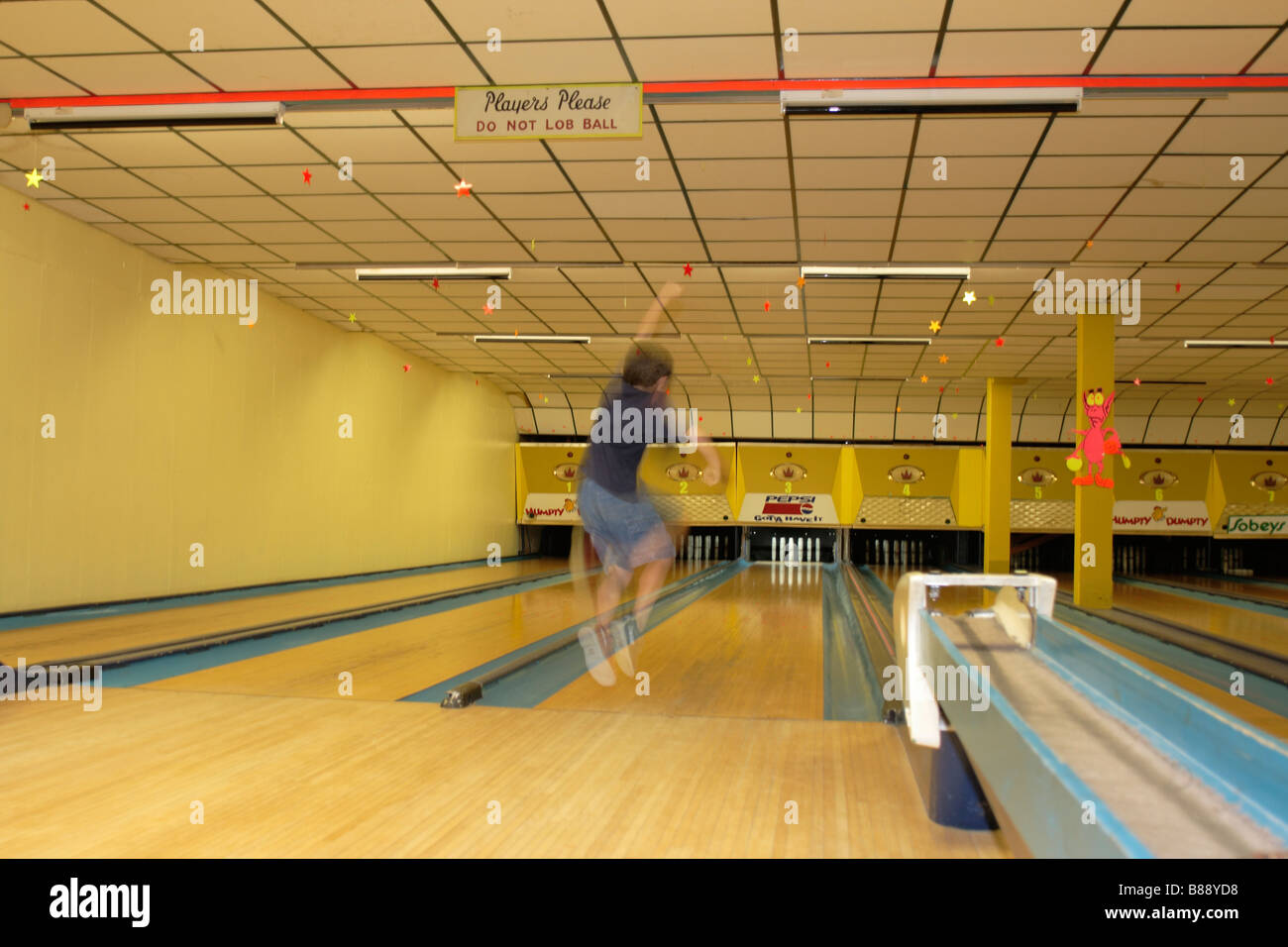 a 5 year old child bowling Stock Photo