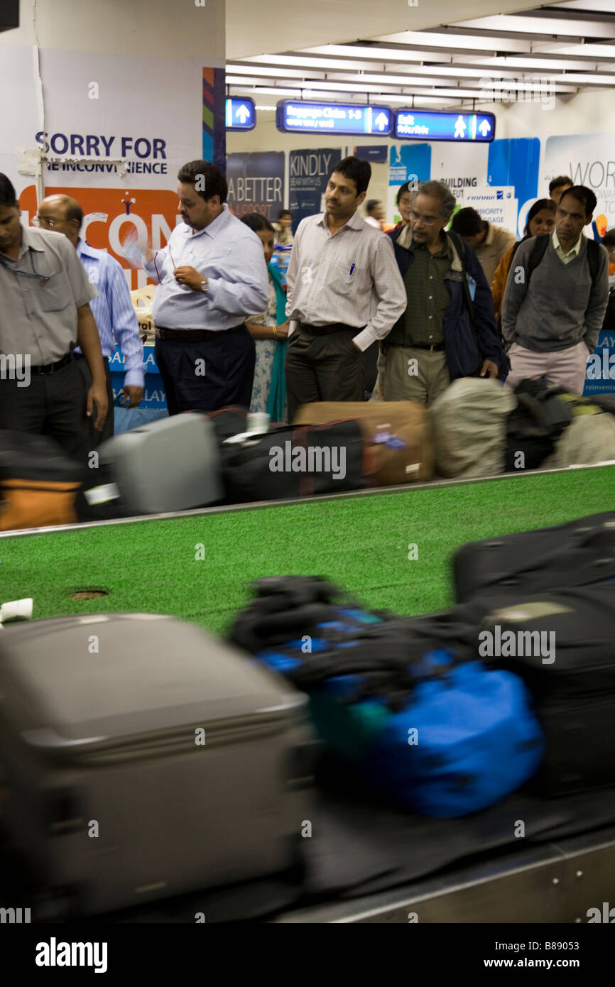 Passengers luggage baggage reclaim carousel belt in Mumbai / Bombay