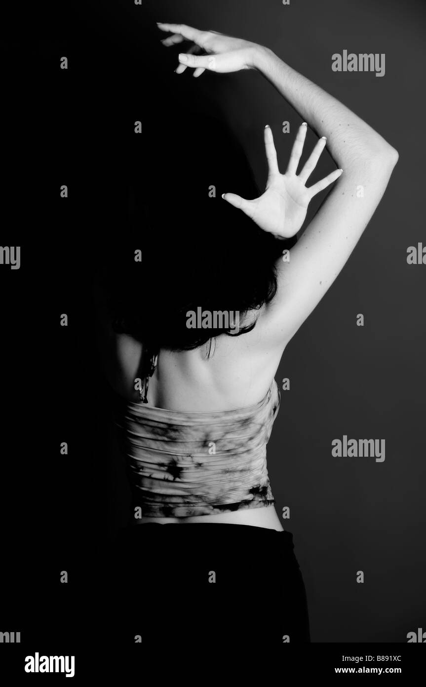 Portrait in black and white of young contemporary female dancer in artistic pose Stock Photo