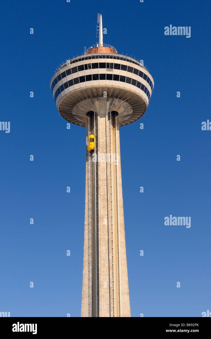 Ride to the top of the Skylon Tower at Niagara Falls Canada against a blue sky Stock Photo
