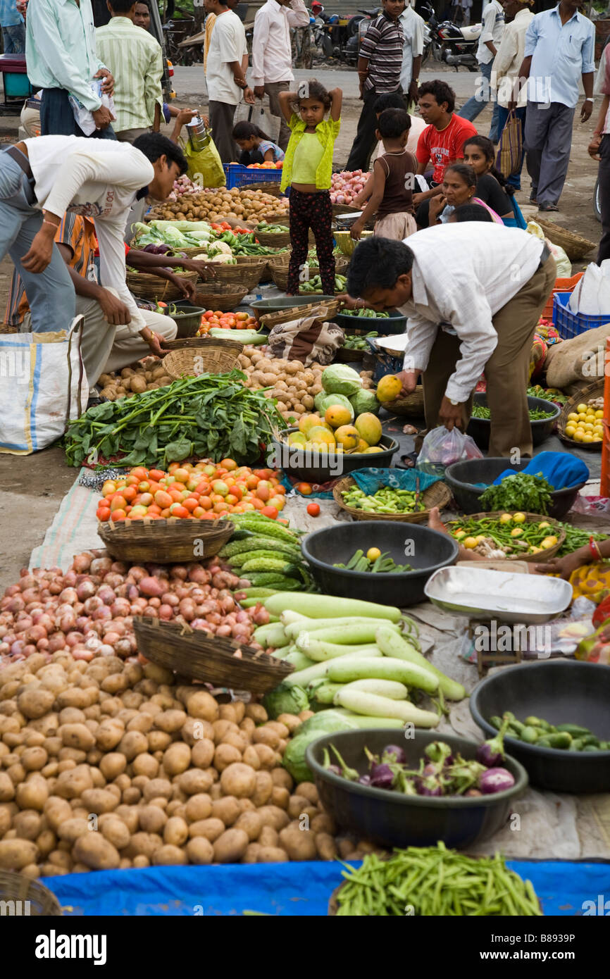 Fresh fruit and vegetables displayed at a local market stall. Hazira