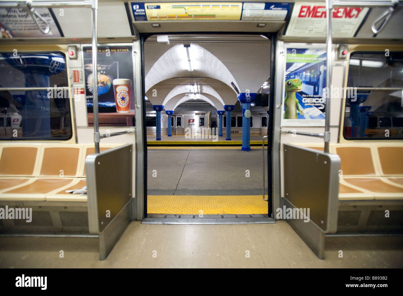 A view of a open door of a subway car in a subway station. Stock Photo