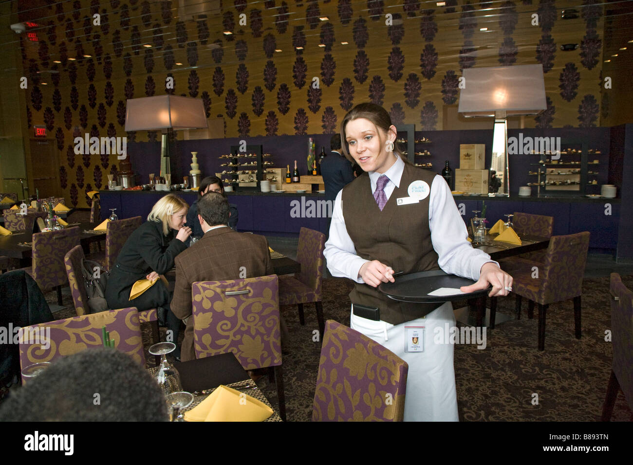 Detroit Michigan A waitress at the Bistro 555 Restaurant in Greektown Casino Hotel Stock Photo