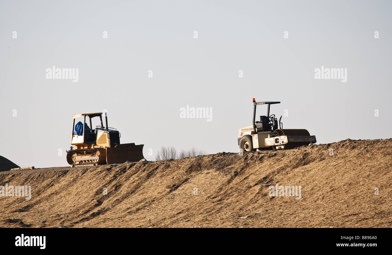 Construction equipment used while building a road Stock Photo