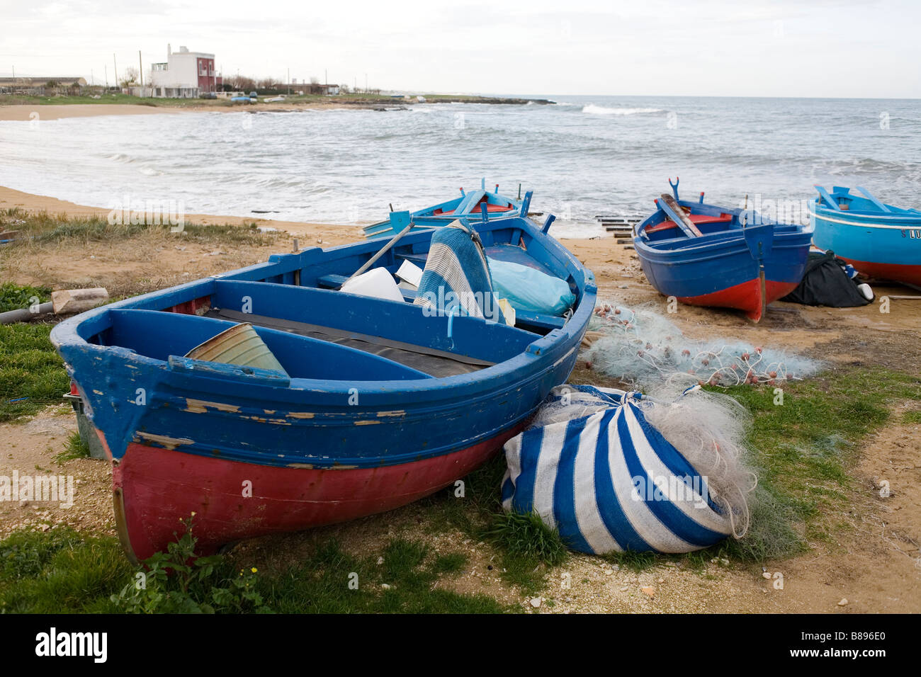 Fishing boats on the coast of Puglia, southern Italy. Stock Photo