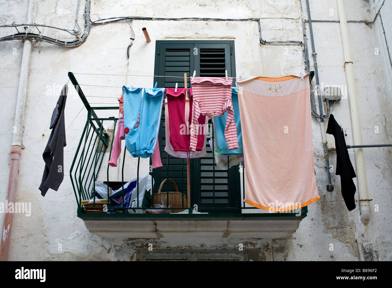 Washing hanging outside in Monopoli Old Town, southern Italy. Stock Photo