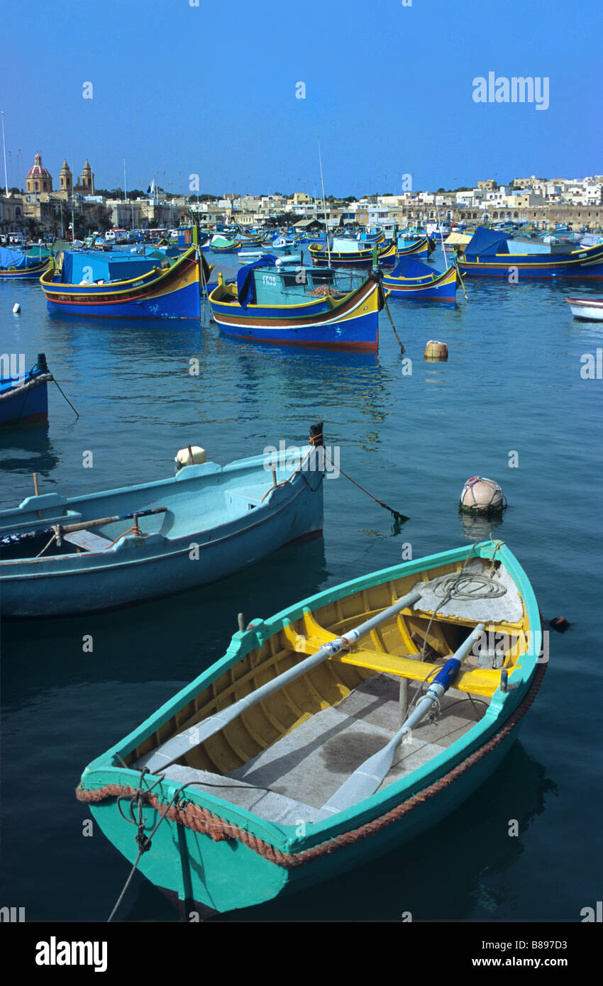 Colourful Maltese Fishing Boats & Village of Marsaxlokk, Malta Stock ...