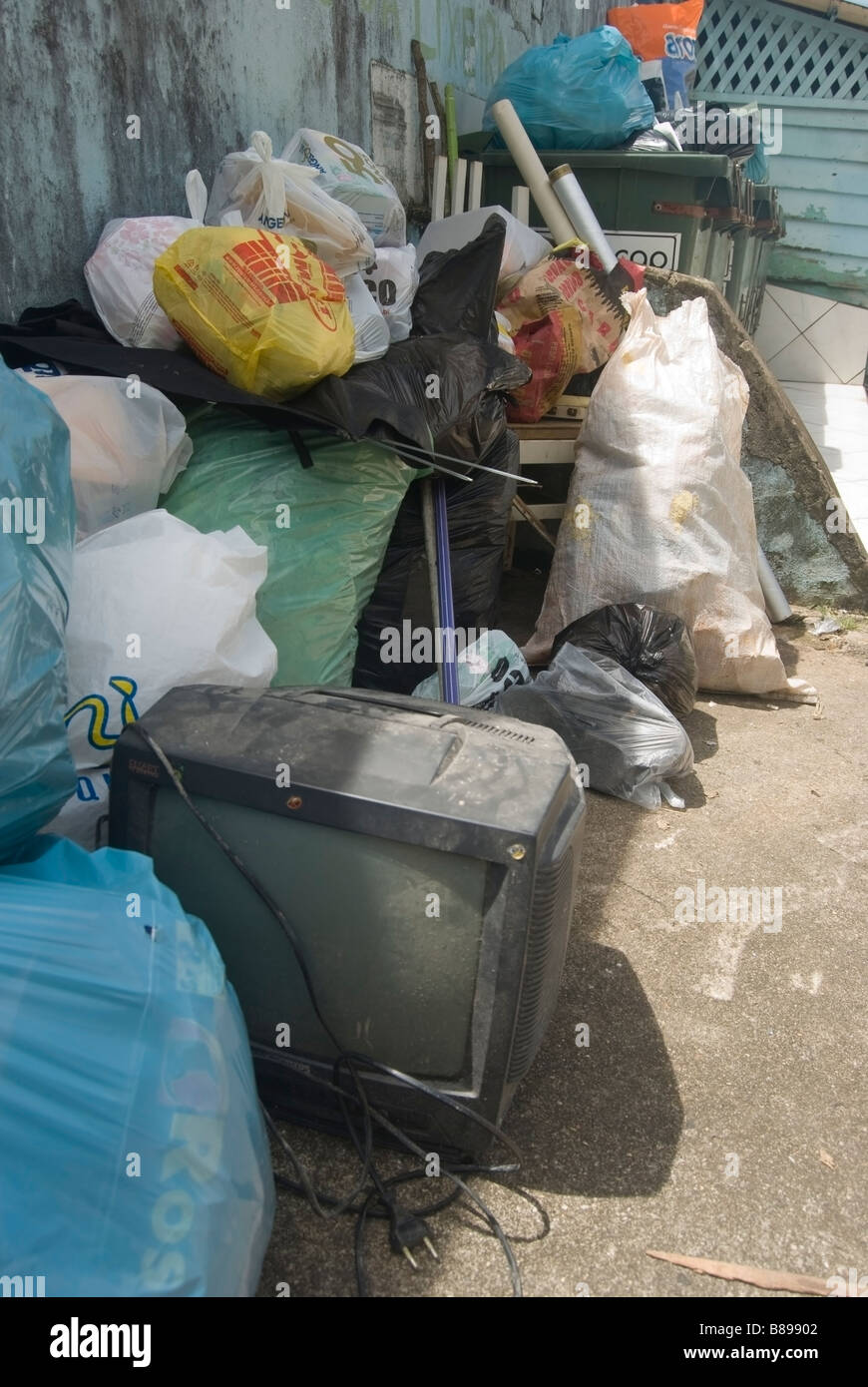 An old TV in the garbage Stock Photo Alamy