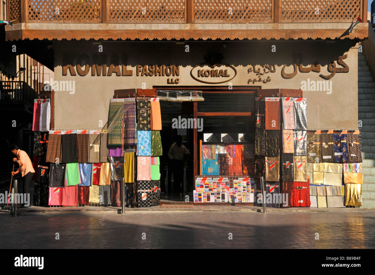 Dubai shop selling fashion fabric Stock Photo Alamy