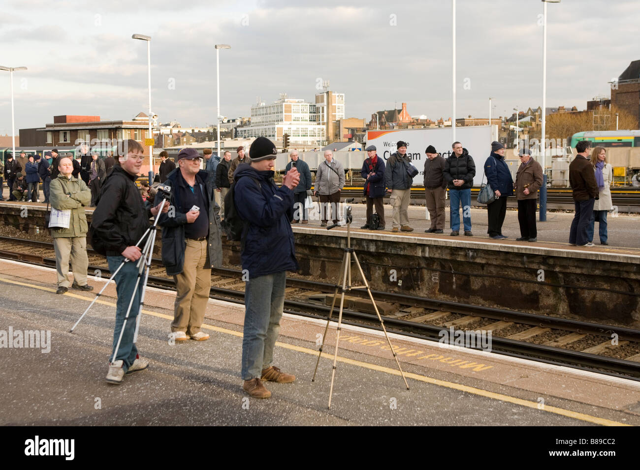 Train spotters at Clapham Junction waiting for the 'Tornado Steam Engine' a Peppercorn A1 Pacific steam train Stock Photo