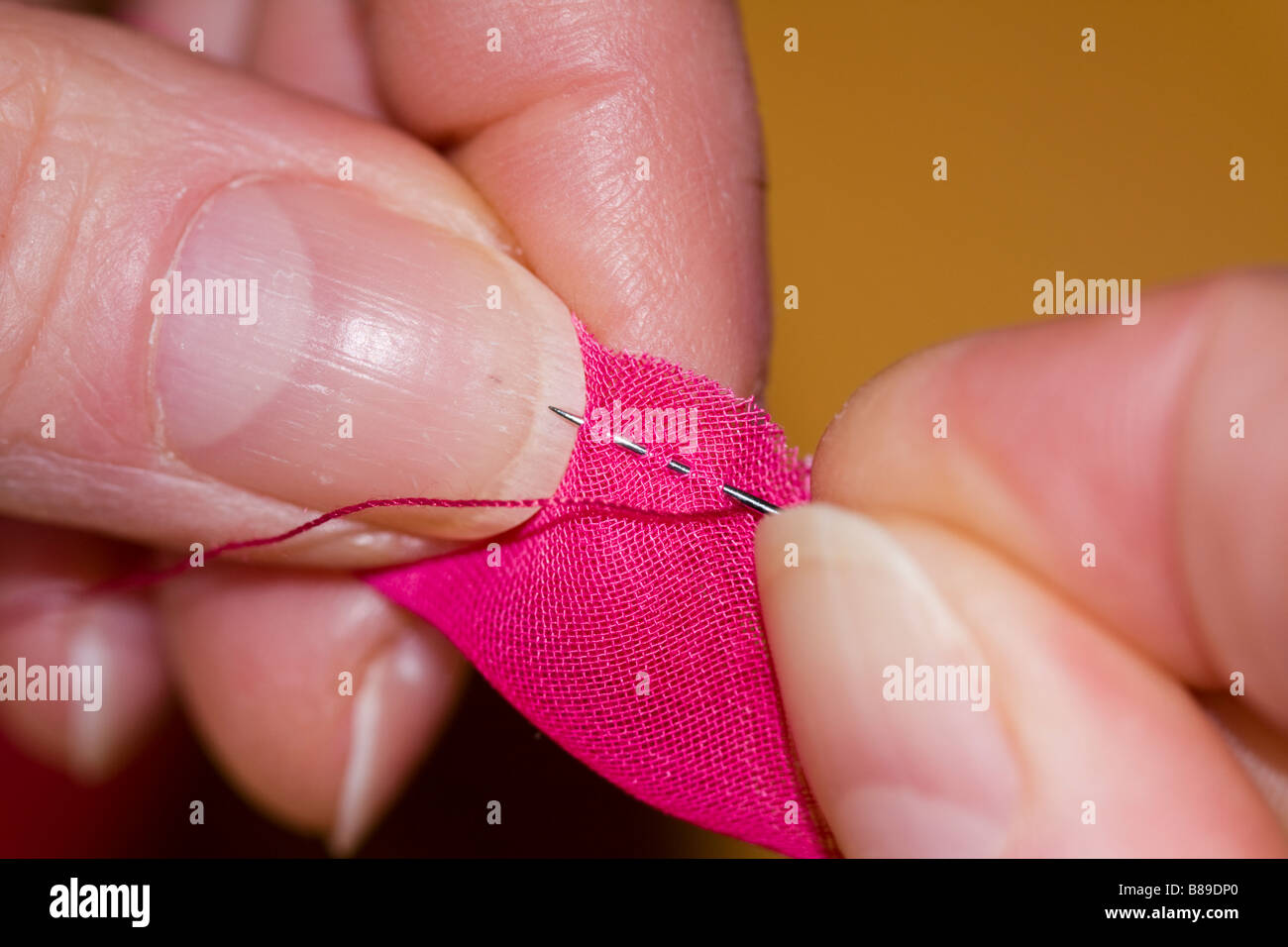Running stitches - handsewing Stock Photo