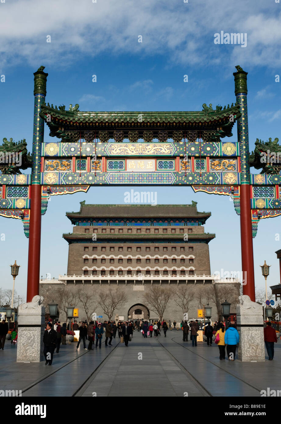 Ornate traditional Chinese gate with Zhengyangmen gate to rear at newly rebuilt Qianmen Street in Beijing 2009 Stock Photo