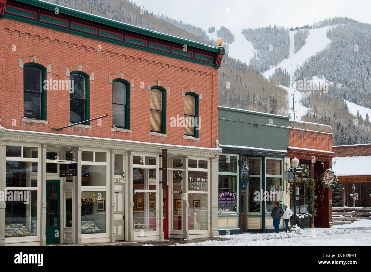 Shops and ski slopes from Colorado Avenue, Telluride, Colorado Stock