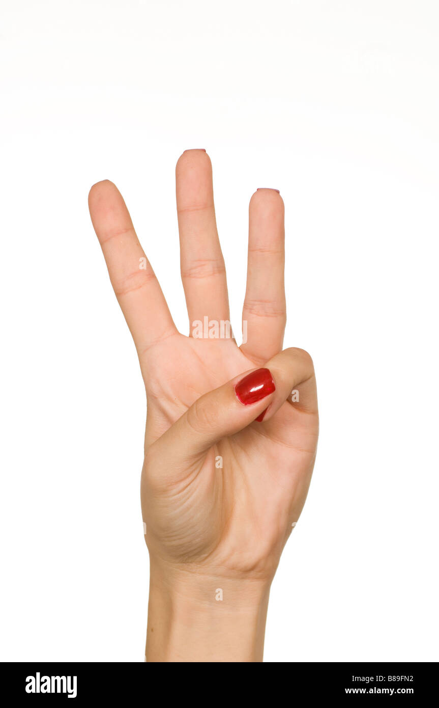 Woman's hand counting three Stock Photo