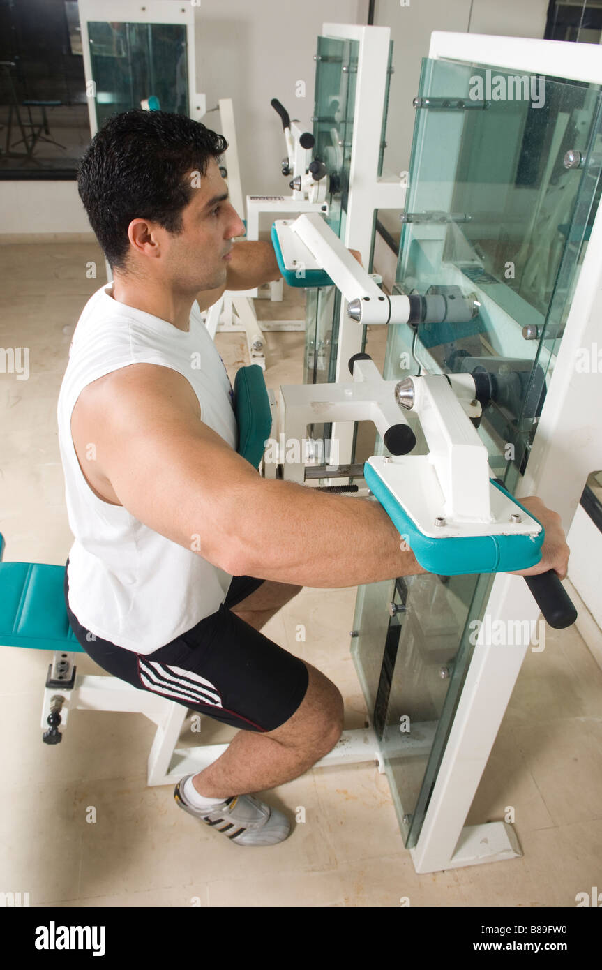 Man exercising in the gym Stock Photo
