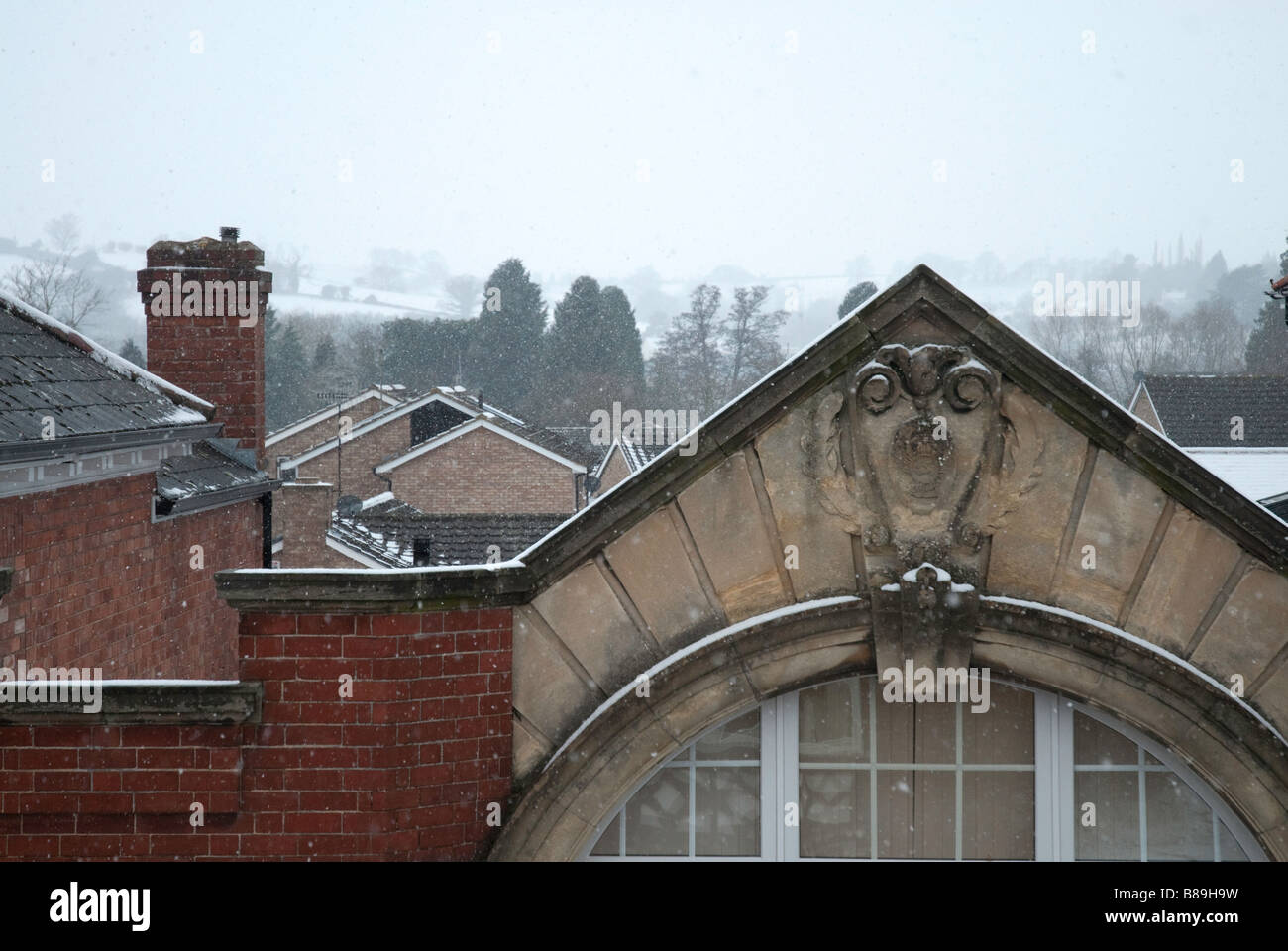 Wintery rooftop scene in the snow Stock Photo