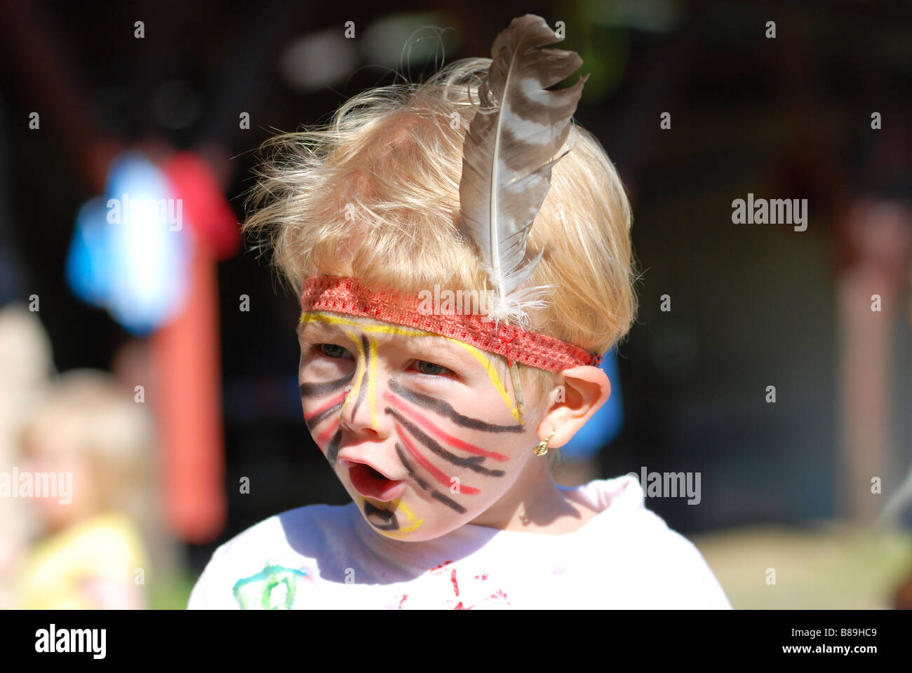 litlle girl masked as native indian Stock Photo