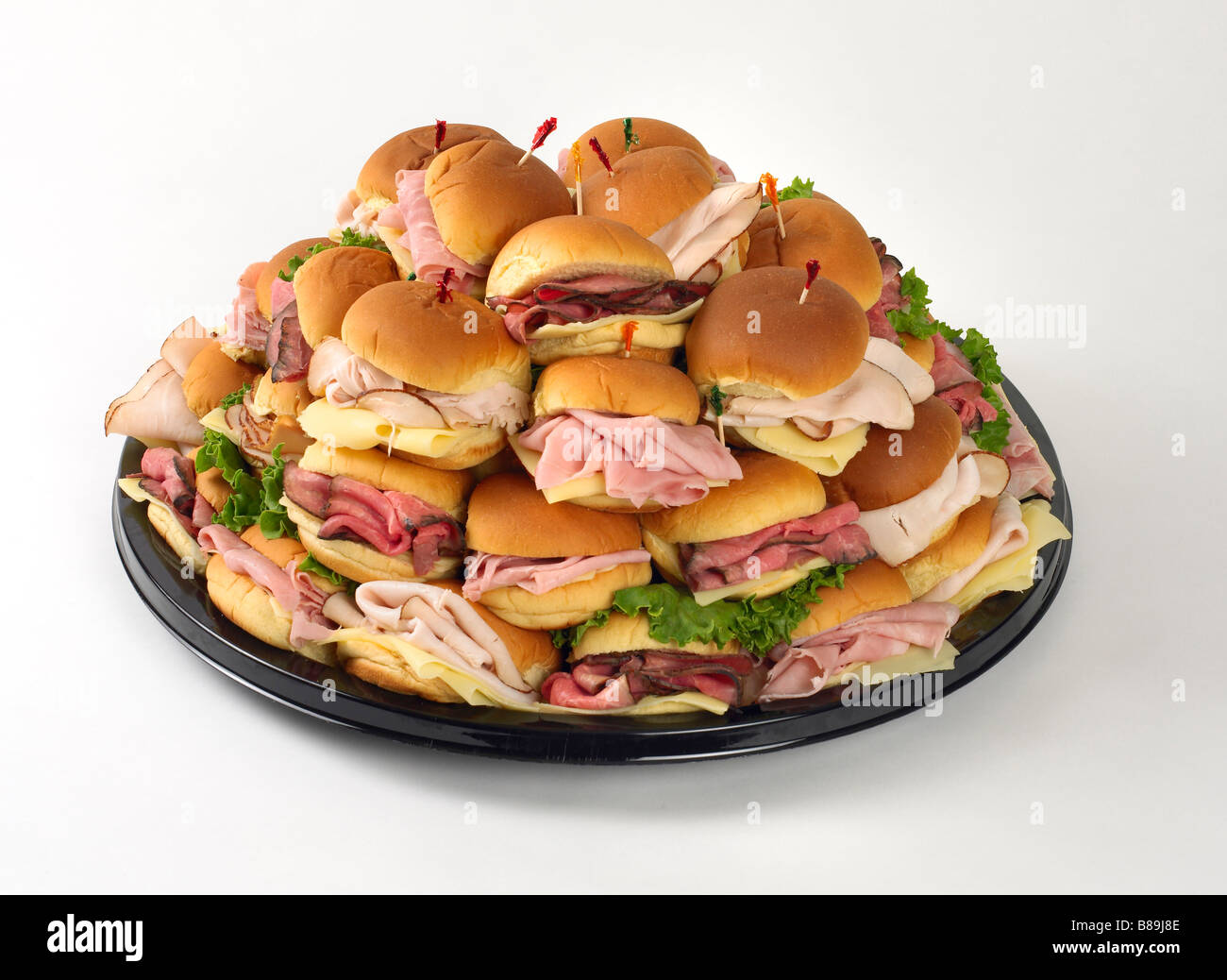 Large deli tray mini assorted sandwiches Stock Photo - Alamy